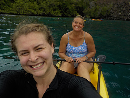 After snorkeling to our heart's delight, we very ungracefully climbed back into our kayaks.  Kayakers are not allowed to beach the kayak, and must tie the kayak off to ourmselves while snorkeling (which was much easier than I thought it would be).  Laura and Brooke acted like their kayak climb was a piece of cake here while taking many pics of me and Marion's escapade.  After a sucessful reboarding, we raced the storm back to the kayak launch where we were greeted by our first turtle sighting.