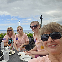 Each year I organize a girls trip for my daughter and myself.  Sometimes we invite others along for the ride.  All of the time we go, go, go.  This year it was a girl from Texas (me), a girl from Washington (daughter), a girl from Cali (sister), and a girl from Arizona (auntie M).  We gathered in Oakland for the final leg of our flights to Kona...on the Big Island Hawaii.  This is us just after we arrived getting a bite to eat at a great place with a view.