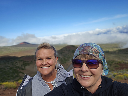 Still time for yet one more adventure for the day, a drive up to the Mauna Kea Visitor Center, where Laura and I hiked to a peak above the cloud line of the tallest mountain in the world.  When you measure Mauna Kea from its base below the ocean it is taller than Mt Everest measured from its base.  Just FYI I didn't say THE top, I said a top.
