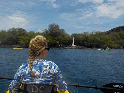 After our best breakfast on the island at The Coffee Shack, we rented a couple double kayaks from a guy down the street from our place.  While launching our kayaks some other people getting out were saying they had seen TONS of dolphin.  Unfortunately Brooke's spirit animal must no longer be a dolphin and we were not lucy enough to encounter any.  However the journey accross the by to Cook's Monument was a nice little work out.