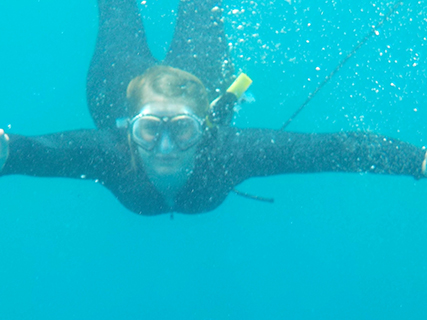 We frolicked and played in the water while tour groups came and went.  No turtles or dolphin but lots of beautiful fish.  Unlike the night before the water was comfortable with the warm sunshine on our backs and lots of moving around.